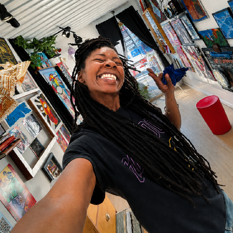 Exhibit A smiles inside her art-filled Container Village studio in West Philly.