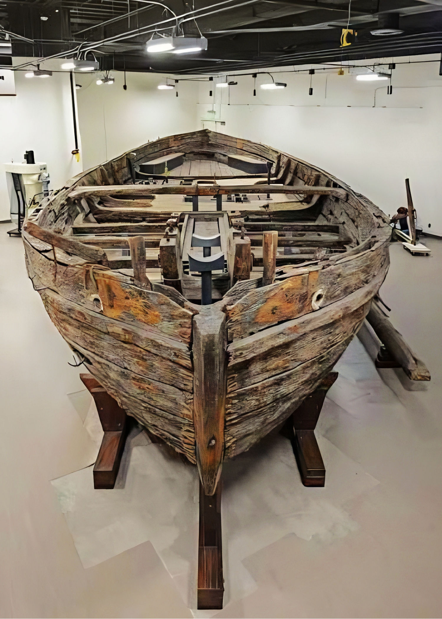 USS Philadelphia gunboat displayed at the Smithsonian during preservation work.
