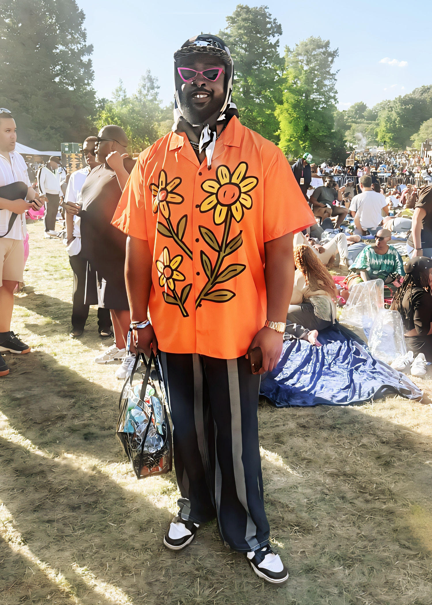 Roots Picnic fashion featuring a bold flower-print festival shirt with colorful accessories and relaxed streetwear.