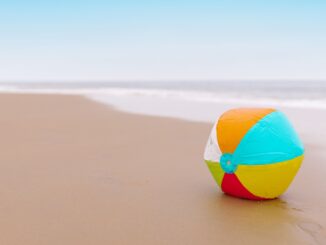 Lone beach ball on the sand for Missed Connections Philadelphia July 2026