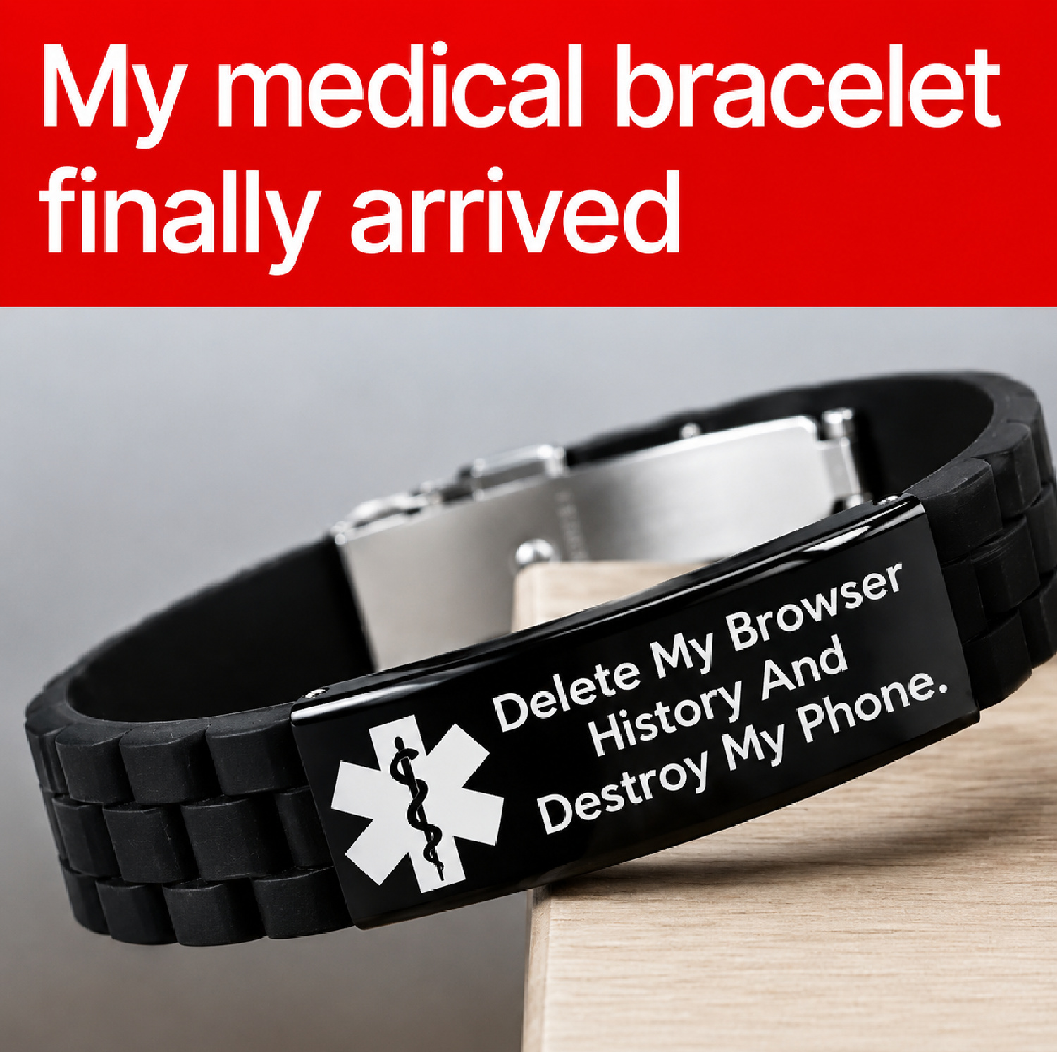 Black medical alert bracelet engraved with “Delete My Browser History And Destroy My Phone” beneath the meme text, “My medical bracelet finally arrived.”