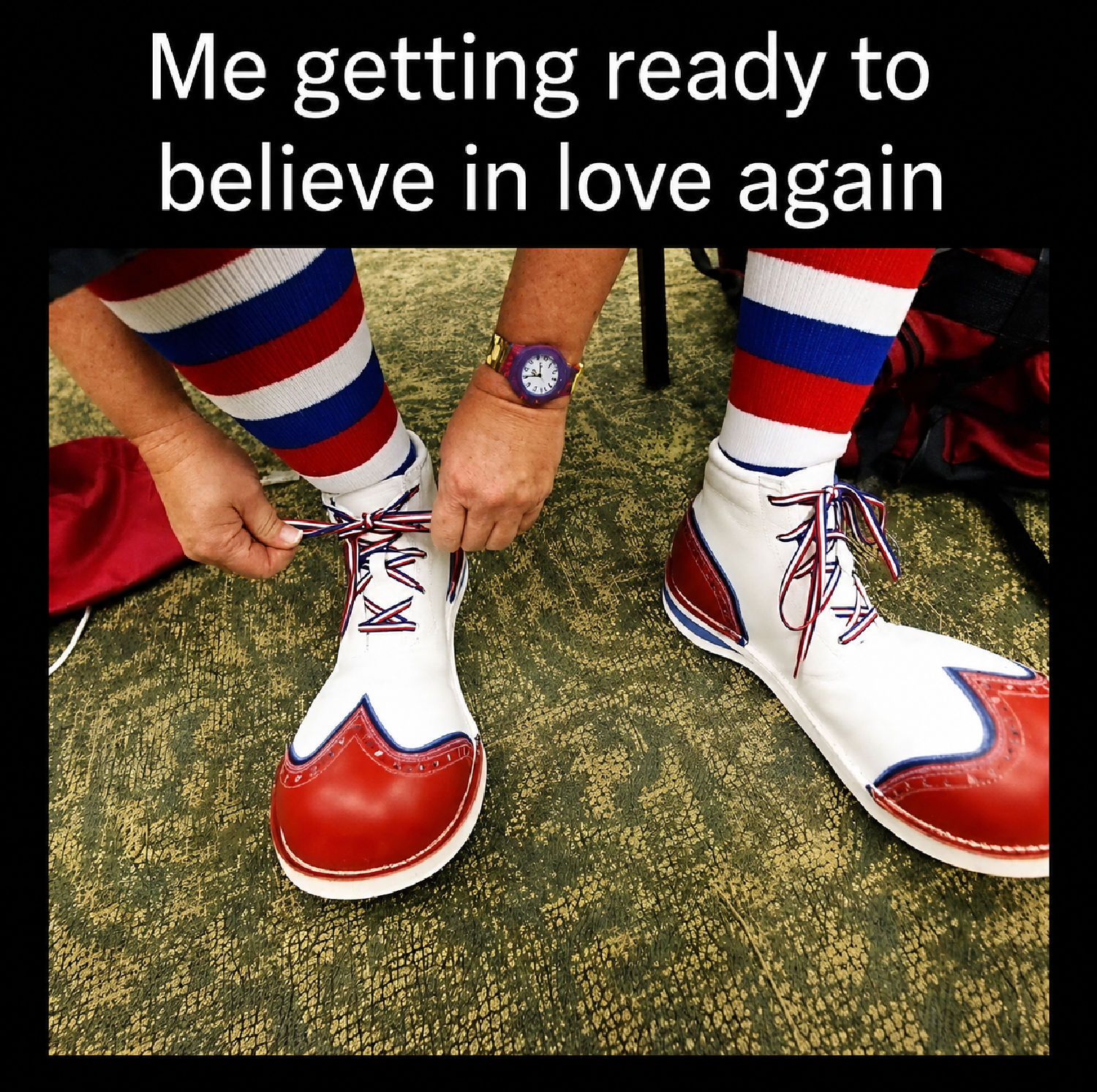 Person tying oversized clown shoes beneath the meme text, “Me getting ready to believe in love again.”