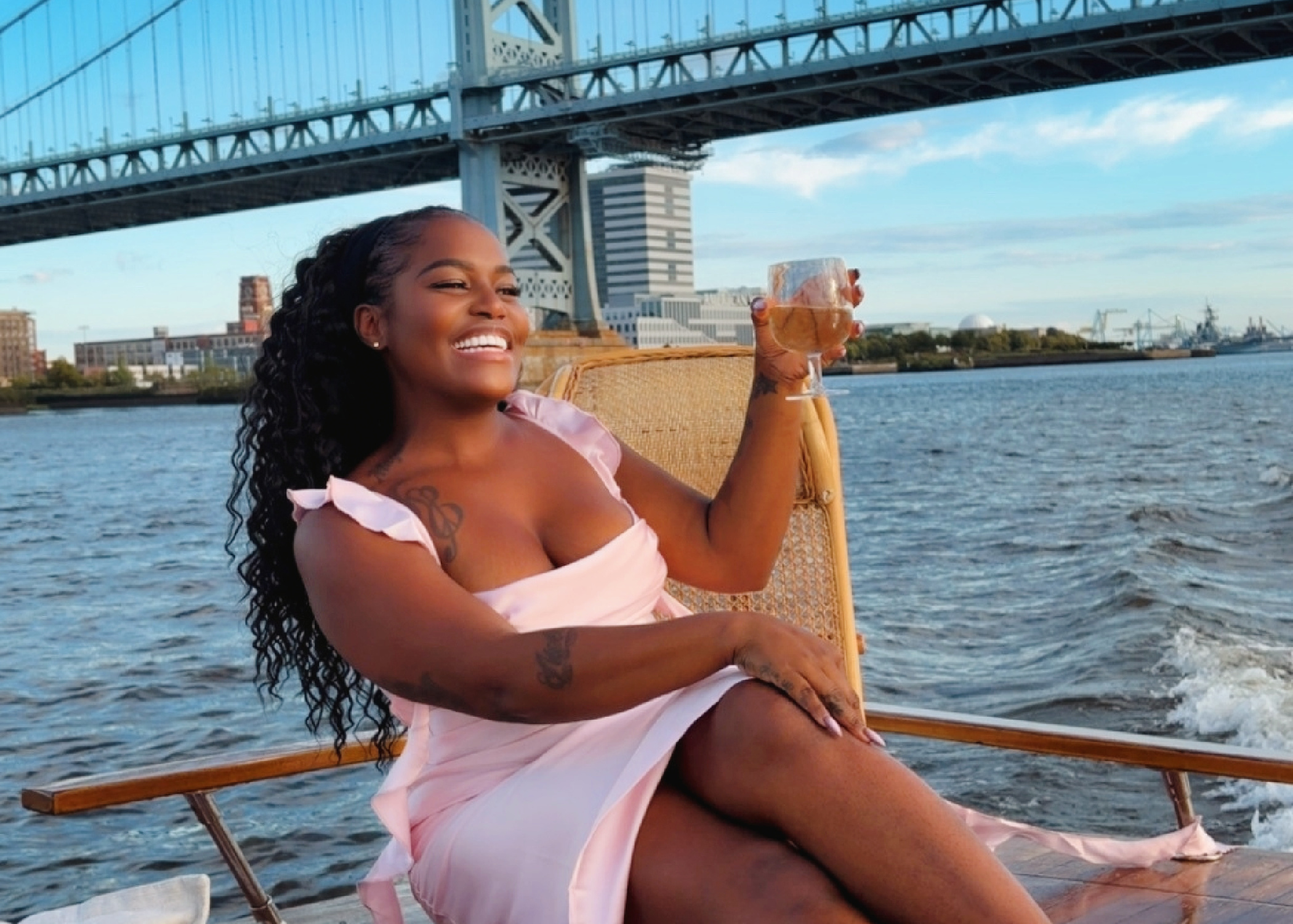 Melissa Finds Philly enjoying a boat ride with Sea Philly on the Delaware River beneath the Benjamin Franklin Bridge