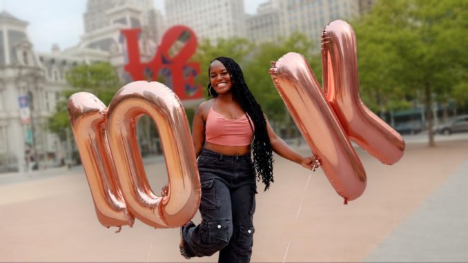 Melissa Finds Philly at LOVE Park celebrating 10K followers with balloons
